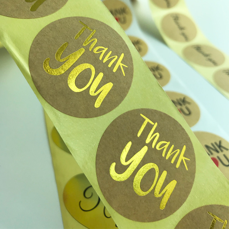 Label pelekat kertas bersalut